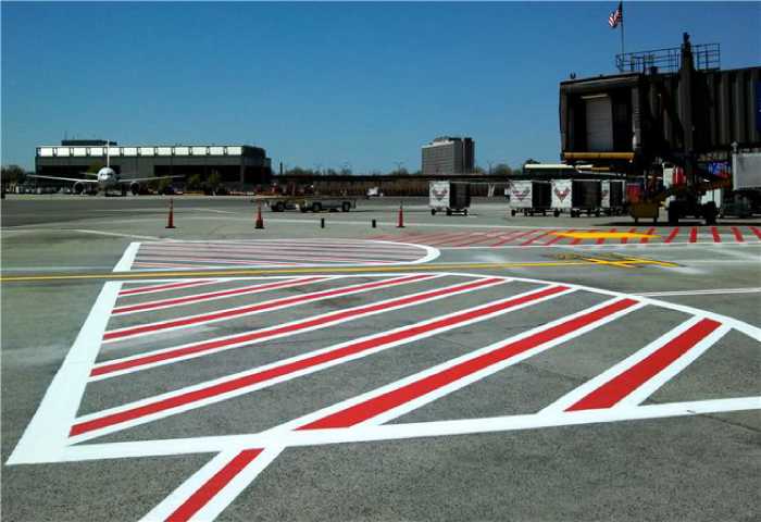 We Do Lines - red and white lines on a runway.