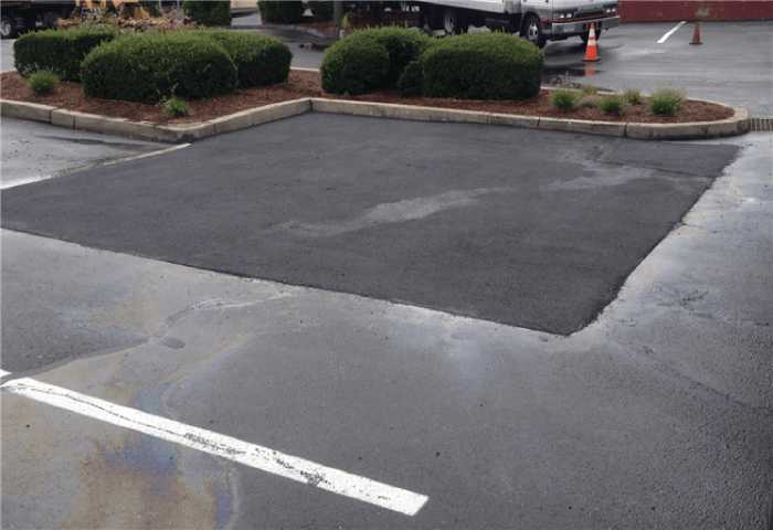 We Do Lines - A parking lot with a white line.