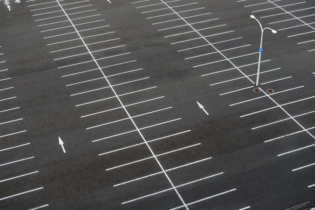 We Do Lines - An aerial view of a parking lot with white lines.